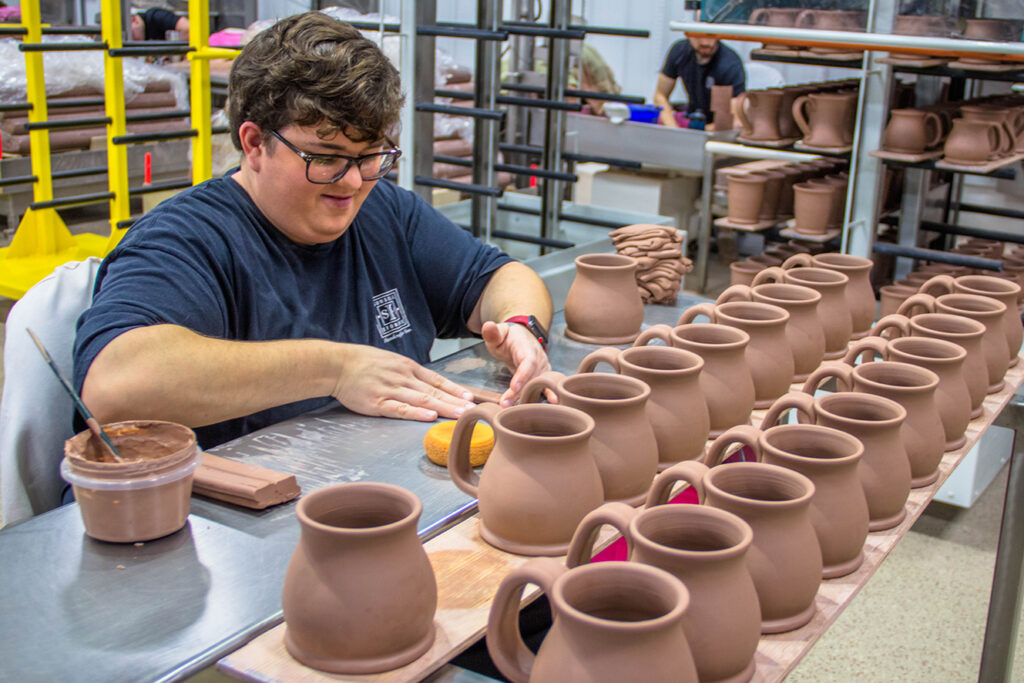 Sunset Hill Stoneware employee working
